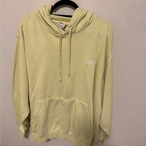 Nike Soft Yellow unisex men’s and women’s hoodie has some stains.